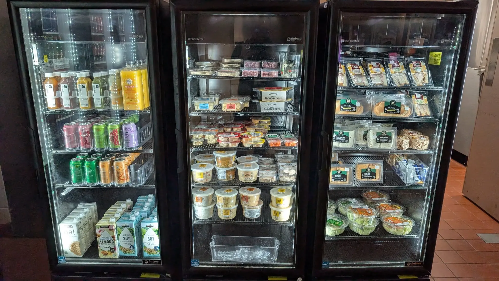 Fresh food coolers stocked with salads, sandwiches and drinks